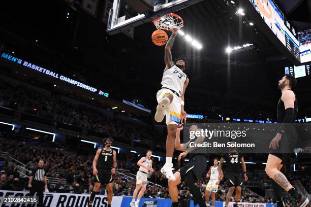 David Joplin of the Marquette Golden Eagles dunks the ball against the Colorado Buffaloes during the second round of the 2024 NCAA Men's Basketball...