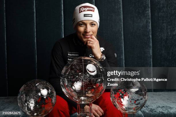 Lara Gut-Behrami of Team Switzerland poses with the Crystal Globes after winning the season’s overall, Super G and Giant Slalom following the Audi...