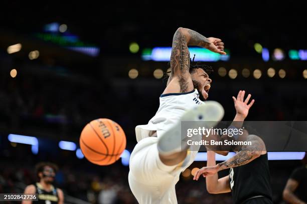 David Joplin of the Marquette Golden Eagles dunks the ball against the Colorado Buffaloes during the second round of the 2024 NCAA Men's Basketball...