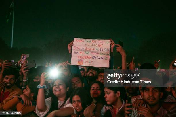 Students enjoy the performance of Bollywood singer, rapper, lyricist, and music composer Raftaar during the three-day cultural and tech fest, "Moksha...