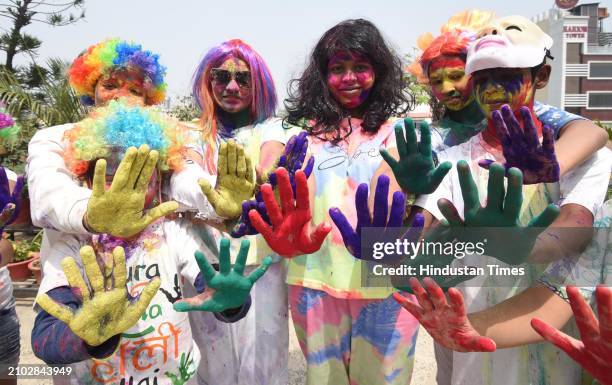 Children plays with colours during Holi celebration on March 24, 2024 in Patna, India.