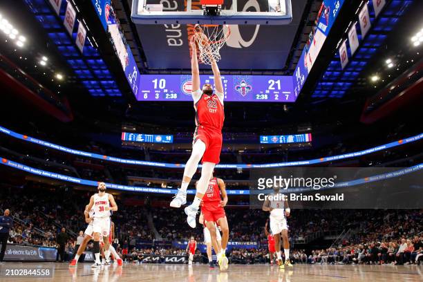 Larry Nance Jr. #22 of the New Orleans Pelicans dunks the ball during the game against the Detroit Pistons on March 24, 2024 at Little Caesars Arena...
