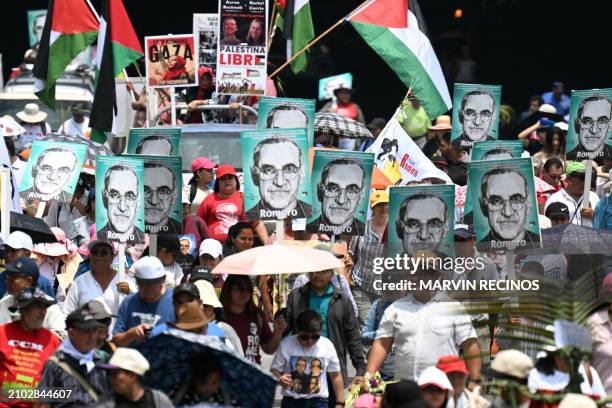 Catholic faithful take part in a pilgrimage to commemorate the 44nd anniversary of the assassination of Salvadoran Archbishop, Saint Oscar Arnulfo...