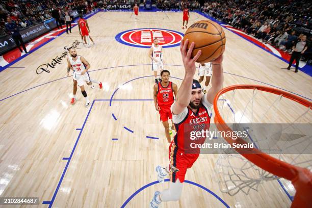 Larry Nance Jr. #22 of the New Orleans Pelicans dunks the ball during the game against the Detroit Pistons on March 24, 2024 at Little Caesars Arena...