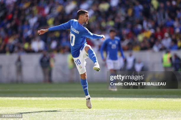 Italy's forward Lorenzo Pellegrini scores his team's first goal during the international friendly football match between Italy and Ecuador at Red...