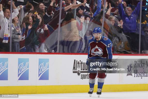Jonathan Drouin of the Colorado Avalanche celebrates the game-winning goal against the Pittsburgh Penguins at Ball Arena on March 24, 2024 in Denver,...