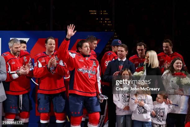 Oshie of the Washington Capitals is joined by Chairman Dick Patrick, President of Hockey Operations, General Manager Brian MacLellan, teammates, and...