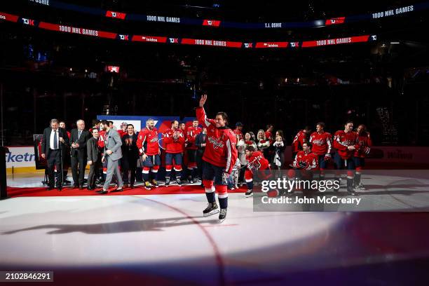 Oshie of the Washington Capitals is joined by Chairman Dick Patrick, President of Hockey Operations, General Manager Brian MacLellan, teammates, and...