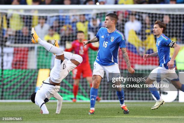 Ecuador's forward Gonzalo Plata fights for the ball with Italy's defender Gianluca Mancini during the international friendly football match between...