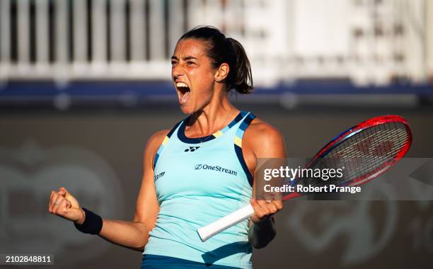 Caroline Garcia of France in action against Naomi Osaka of Japan in the third round on Day 9 of the Miami Open Presented by Itau at Hard Rock Stadium...