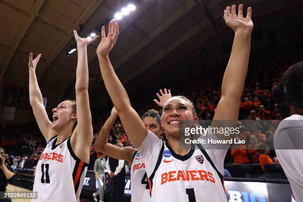 Marotte Kennedie Shuler of the Oregon State Beavers wave to fans after the Beavers' win against the Nebraska Cornhuskers during the second round of...