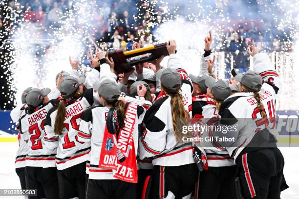 The Ohio State Buckeyes hoist the trophy after winning the Division I Women's Ice Hockey Championship game held at Whittemore Center Arena on March...