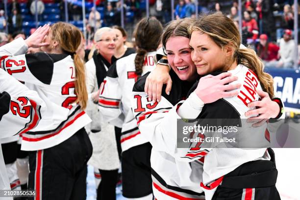 Riley Brengman of the Ohio State Buckeyes celebrates with Kenzie Hauswirth of the Ohio State Buckeyes during the Division I Women's Ice Hockey...