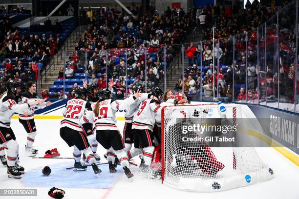 The Ohio State Buckeyes celebrate after winning the Division I Women's Ice Hockey Championship game held at Whittemore Center Arena on March 24, 2024...