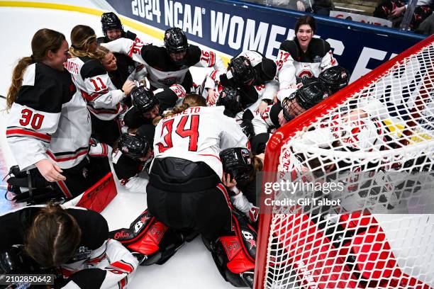 The Ohio State Buckeyes celebrate after winning the Division I Women's Ice Hockey Championship game held at Whittemore Center Arena on March 24, 2024...