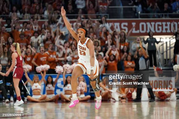 Aaliyah Moore of the Texas Longhorns reacts to a three-point basket during the second round of the 2024 NCAA Women's Basketball Tournament held at...