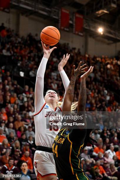 Clara Strack of the Virginia Tech Hokies shoots over Dre'Una Edwards of the Baylor Lady Bears in the first quarter of their game during the second...