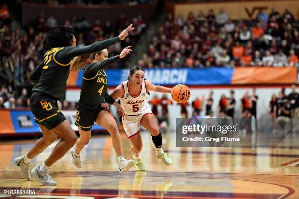 Georgia Amoore of the Virginia Tech Hokies drives against Jana Van Gytenbeek of the Baylor Lady Bears in the first quarter of their matchup during...