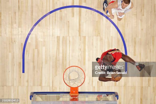Zion Williamson of the New Orleans Pelicans dunks the ball during the game against the Detroit Pistons on March 24, 2024 at Little Caesars Arena in...