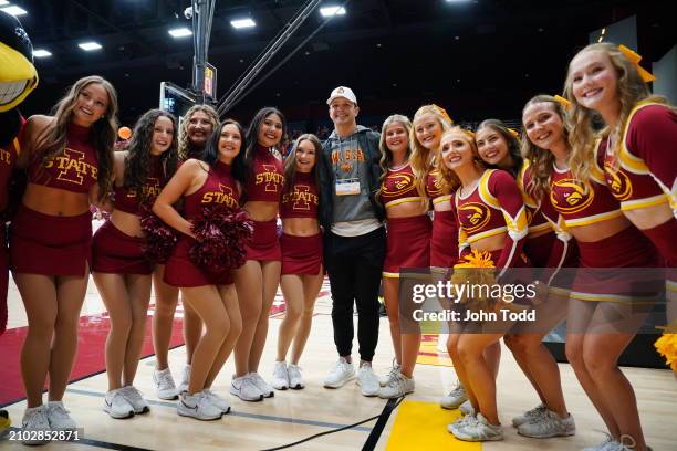 Brock Purdy of the San Francisco 49ers poses with the Iowa State Cyclones cheer team before the game against the Stanford Cardinal during the second...