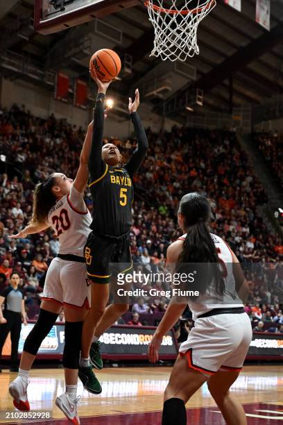 Darianna Littlepage-Buggs of the Baylor Lady Bears puts up a shot against Olivia Summiel of the Virginia Tech Hokies in the fourth quarter during the...
