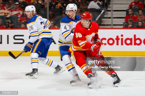 Andrei Kuzmenko of the Calgary Flames skates against the Buffalo Sabres at Scotiabank Saddledome on March 24, 2024 in Calgary, Alberta, Canada.