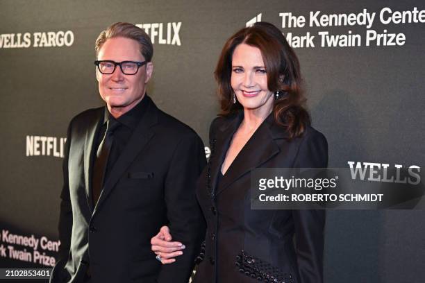 Timothy R. Lowery and US actress Lynda Carter arrive for the 25th Annual Mark Twain Prize For American Humor at the John F. Kennedy Center for the...