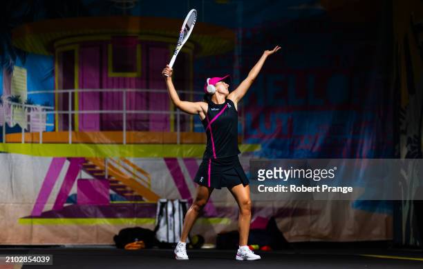Iga Swiatek of Poland warms up before playing against Linda Noskova of the Czech Republic in the third round on Day 9 of the Miami Open Presented by...