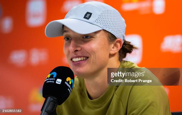 Iga Swiatek of Poland talks to the media after defeating Linda Noskova of the Czech Republic in the third round on Day 9 of the Miami Open Presented...