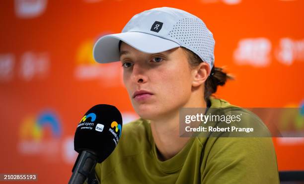 Iga Swiatek of Poland talks to the media after defeating Linda Noskova of the Czech Republic in the third round on Day 9 of the Miami Open Presented...