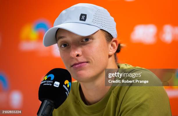 Iga Swiatek of Poland talks to the media after defeating Linda Noskova of the Czech Republic in the third round on Day 9 of the Miami Open Presented...