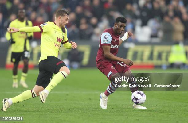 West Ham United's Mohammed Kudus and Burnley's Jacob Bruun Larsen during the Premier League match between West Ham United and Burnley FC at London...