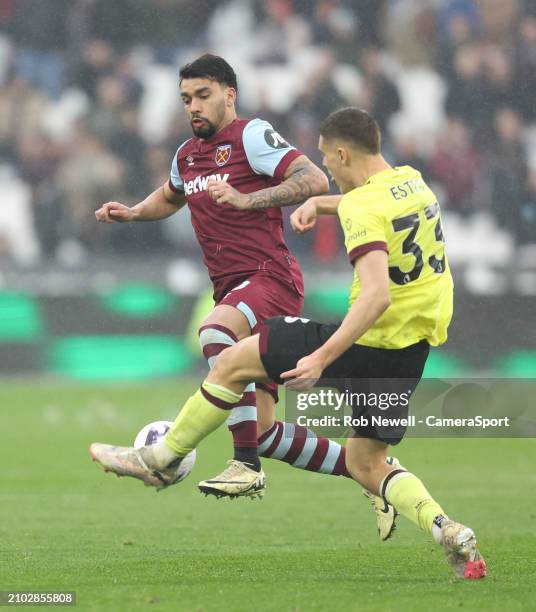 West Ham United's Lucas Paqueta and Burnley's Maxime Esteve during the Premier League match between West Ham United and Burnley FC at London Stadium...