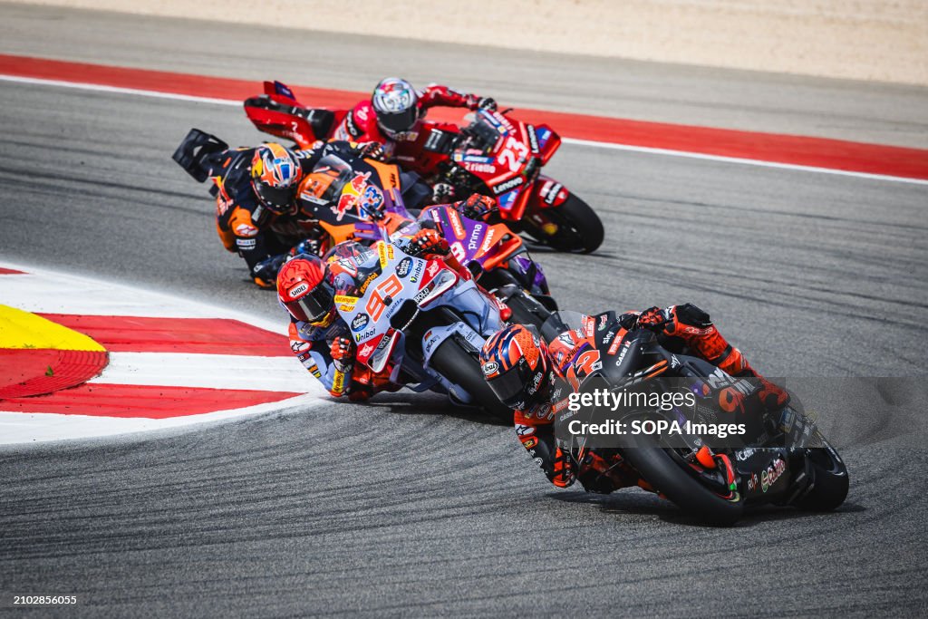 Maverick Vinales of Spain and Aprilia Racing (12), Marc...