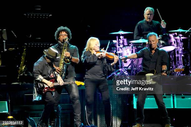 Nils Lofgren, Jake Clemmons, Soozie Tyrell, Bruce Springsteen and Max Weinberg performs with Bruce Springsteen and the E-Street Band at T-Mobile...