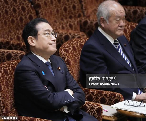 Japanese Prime Minister Fumio Kishida and Finance Minister Shunichi Suzuki attend a House of Councillors budget committee session in Tokyo on March...