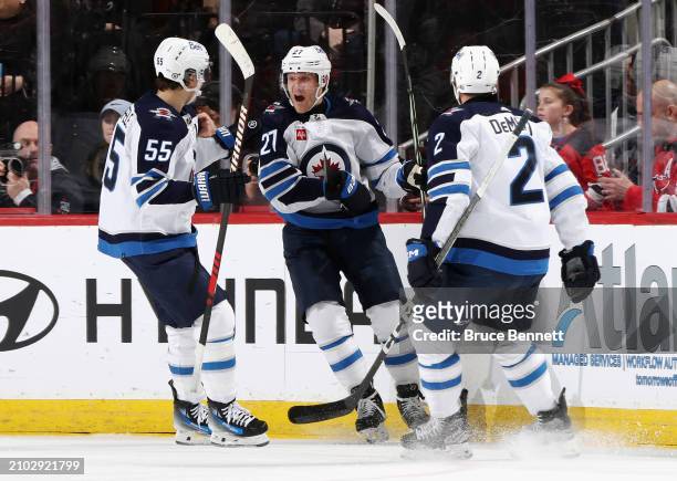 Nikolaj Ehlers of the Winnipeg Jets celebrates his second period goal against the New Jersey Devils at Prudential Center on March 21, 2024 in Newark,...