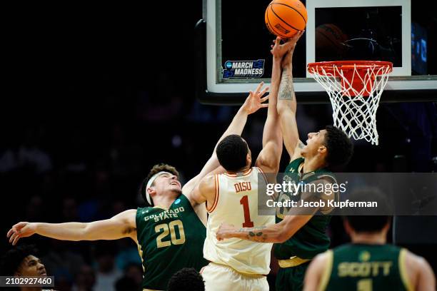 Nique Clifford of the Colorado State Rams blocks a shot by Dylan Disu of the Texas Longhorns during the second half in the first round of the NCAA...