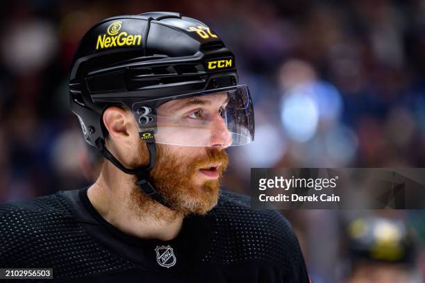 Ian Cole of the Vancouver Canucks looks on during the second period of their NHL game against the Buffalo Sabres at Rogers Arena on March 19, 2024 in...