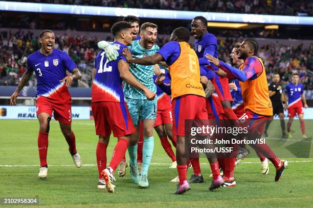 United States players celebrate a last minute goal in second half stoppage time against Jamaica during the Concacaf Nations League semifinal match at...