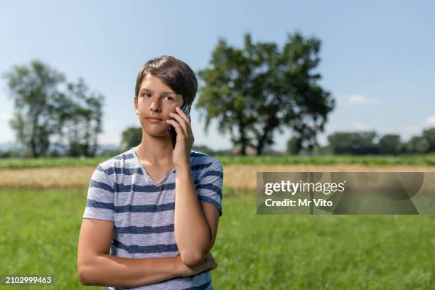 the boy in the barley pool - oat ear stock pictures, royalty-free photos & images