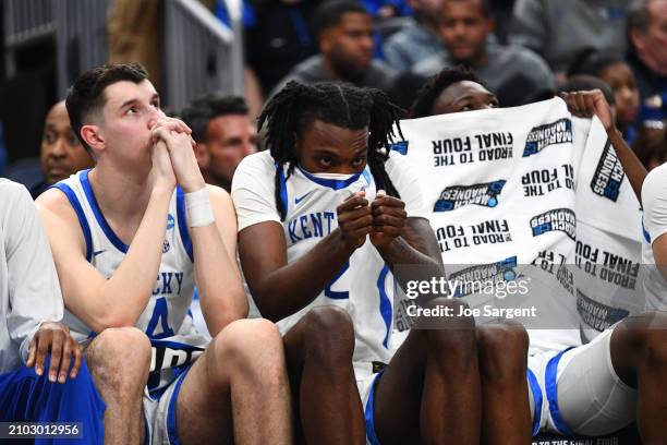 Aaron Bradshaw of the Kentucky Wildcats reacts on the bench during the second half of a game against the Oakland Golden Grizzlies in the first round...