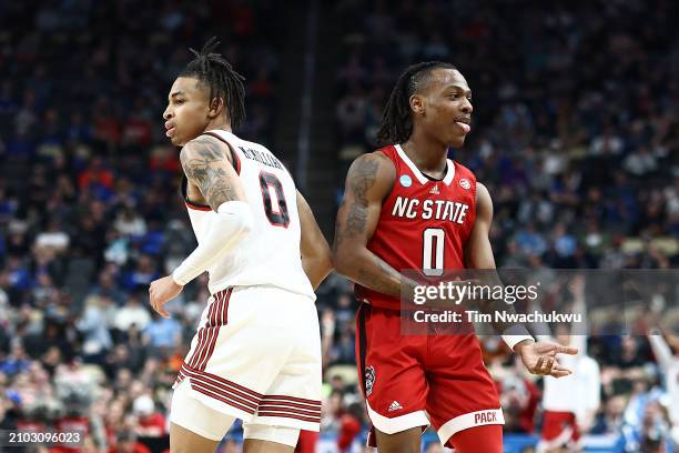 Horne of the North Carolina State Wolfpack celebrates against Chance McMillian of the Texas Tech Red Raiders during the first half in the first round...