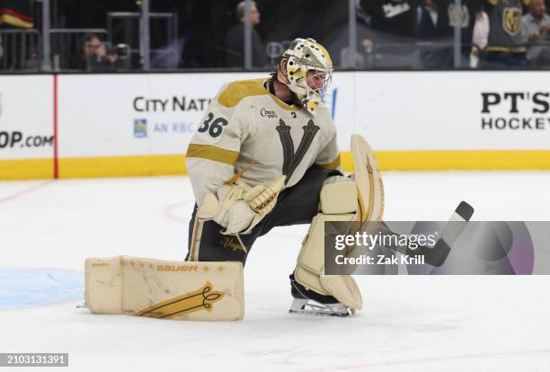 Logan Thompson of the Vegas Golden Knights reacts after a goal by Jack Eichel during the first period against the Seattle Kraken at T-Mobile Arena on...