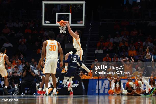 Estrella of the Tennessee Volunteers dunks the ball during the second half against the Saint Peter's Peacocks in the first round of the NCAA Men's...