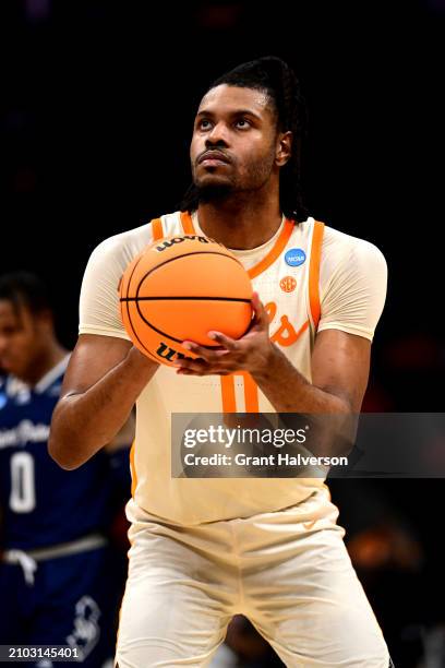Jonas Aidoo of the Tennessee Volunteers shoots a free throw in the second half during the first round of the NCAA Men's Basketball Tournament against...
