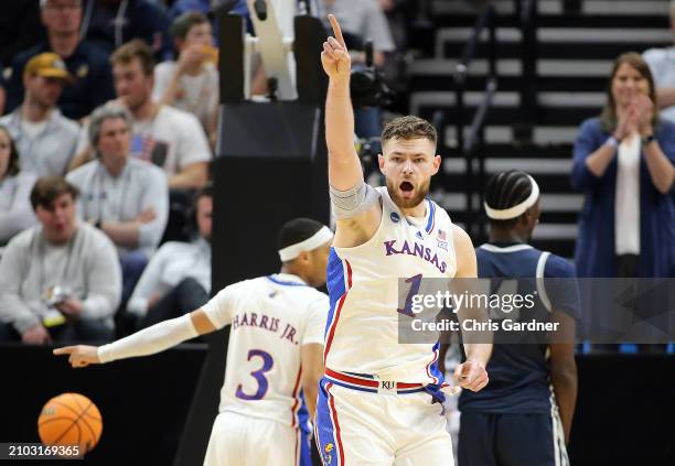 Hunter Dickinson of the Kansas Jayhawks celebrates a basket against the Samford Bulldogs during the first half in the first round of the NCAA Men's...