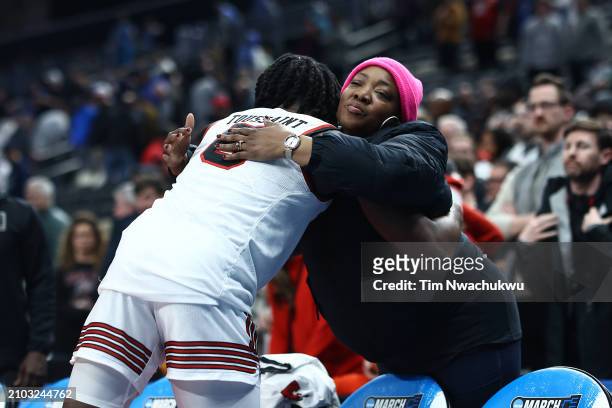 Joe Toussaint of the Texas Tech Red Raiders hugs a family member after a loss to the North Carolina State Wolfpack during the second half in the...