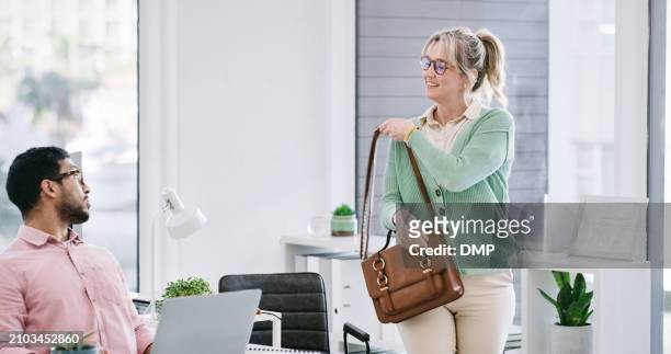 woman, casual and  leaving office with bag for going home, departure and finish work for day. mature, female person, colleague and grab purse for workday over, creative career and closing time. - closing time stock pictures, royalty-free photos & images