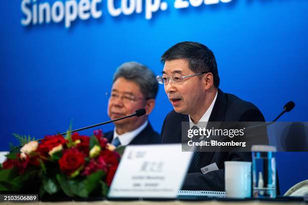 Yu Baocai, president of China Petroleum & Chemical Corp. , right, during a news conference in Hong Kong, China, on Monday, March 25, 2024. Sinopec's...